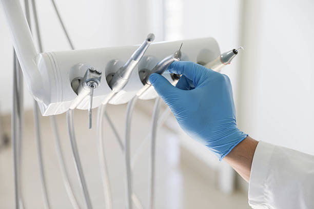 Professional Tooth Extraction technician working in Hurley, MS